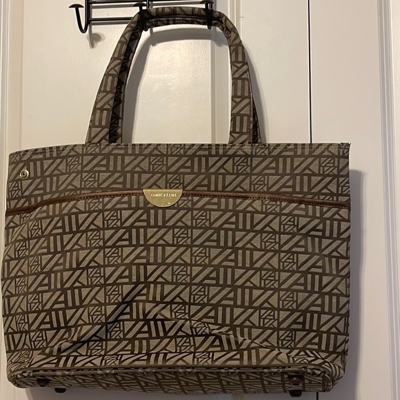 Anne Klein Handbags - Anne Klein laptop tote. Has full zip pocket on outside and zip pocket inside.